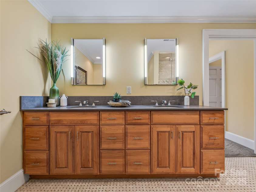 21 Battery Park Avenue, Asheville, NC 28801.  MLS# CAR4322706, YatesRealty ID 8540. Primary bathroom double vanity