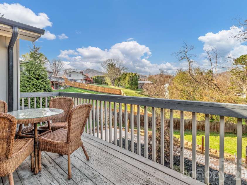 1 Oak Lane, Candler, NC 28715.  MLS# CAR4350223, YatesRealty ID 8543. Back porch