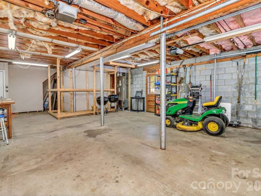 1 Oak Lane, Candler, NC 28715.  MLS# CAR4350223, YatesRealty ID 8543. Huge garage
