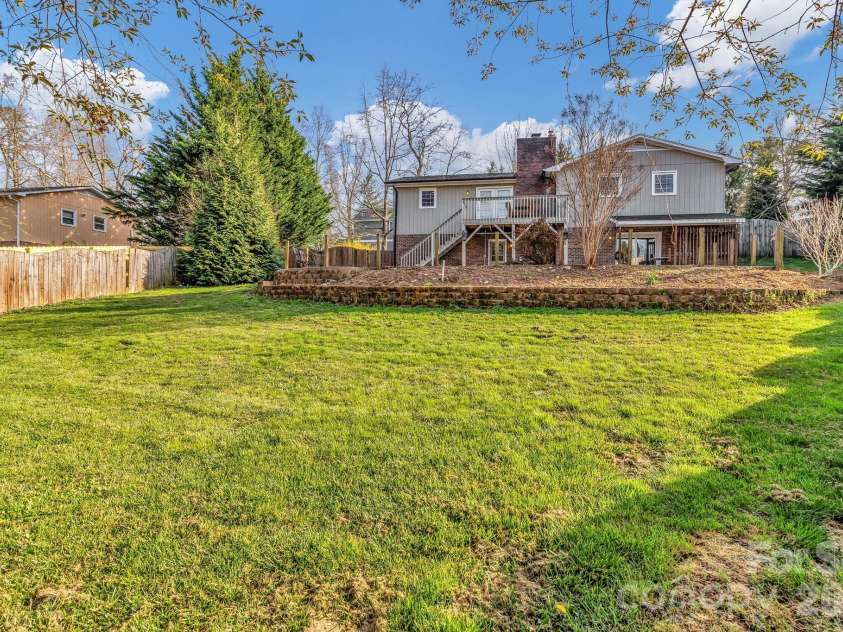 1 Oak Lane, Candler, NC 28715.  MLS# CAR4350223, YatesRealty ID 8543. Large fenced back yard