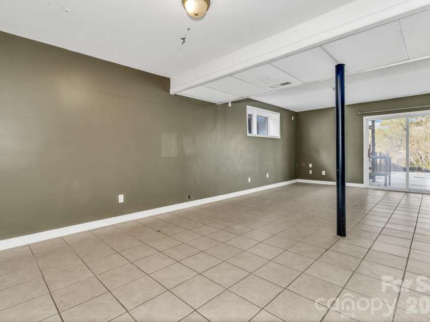1 Oak Lane, Candler, NC 28715.  MLS# CAR4350223, YatesRealty ID 8543. Large finished basement