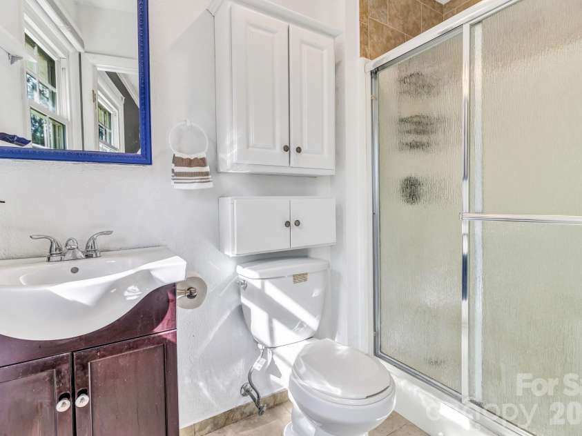 1 Oak Lane, Candler, NC 28715.  MLS# CAR4350223, YatesRealty ID 8543. Primary bath