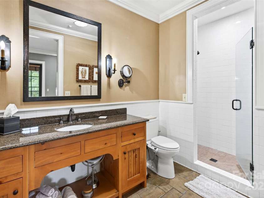 305 Clubhouse Lane, Mill Spring, NC 28756.  MLS# CAR4311469, YatesRealty ID 8548. Primary bath