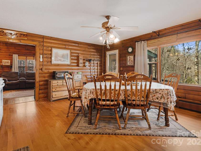 68 Meadow Lane, Mars Hill, NC 28754.  MLS# CAR4233097, YatesRealty ID 8548. Country Style Cabin, Log Siding