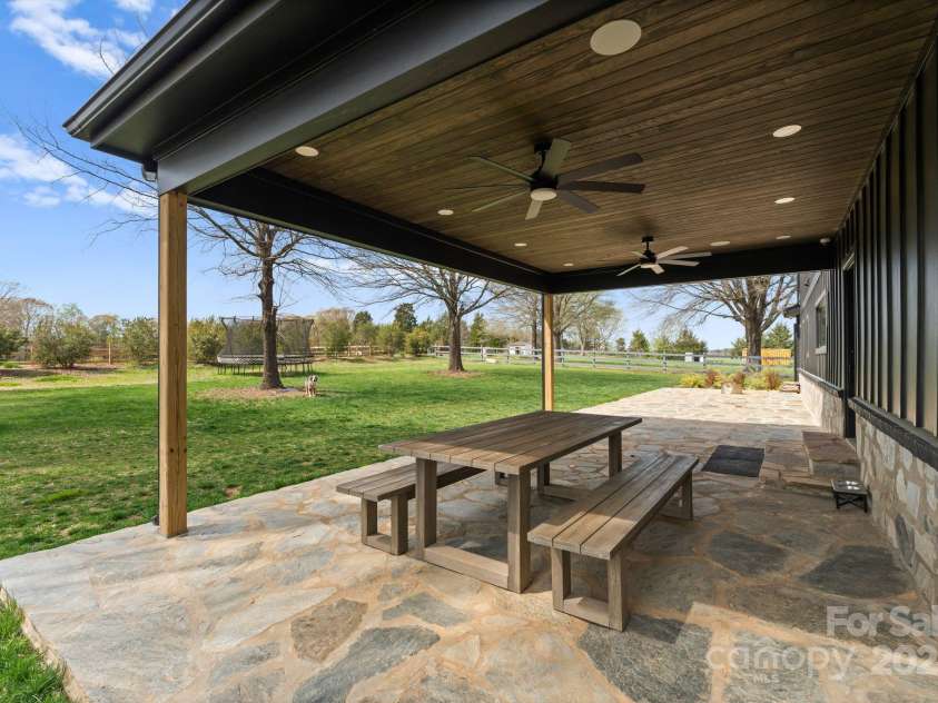 1565 Shinnville Road, Cleveland, NC 27013.  MLS# CAR4215250, YatesRealty ID 855. Outdoor side covered area perfect for grilling 