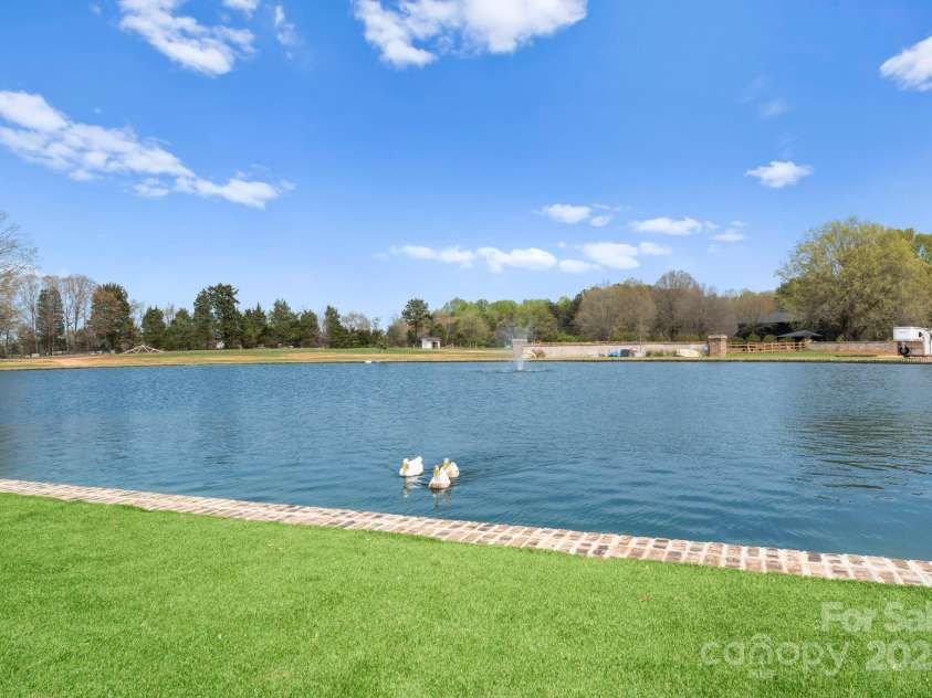 1565 Shinnville Road, Cleveland, NC 27013.  MLS# CAR4215250, YatesRealty ID 855. Pond stocked with bass and karp overlooking the event venue