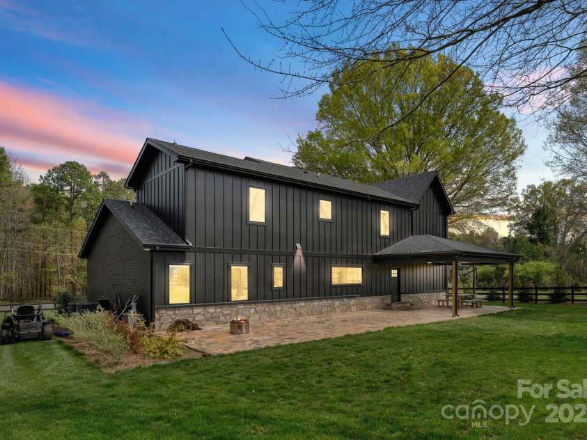 1565 Shinnville Road, Cleveland, NC 27013.  MLS# CAR4215250, YatesRealty ID 855. Rear of custom home on the property