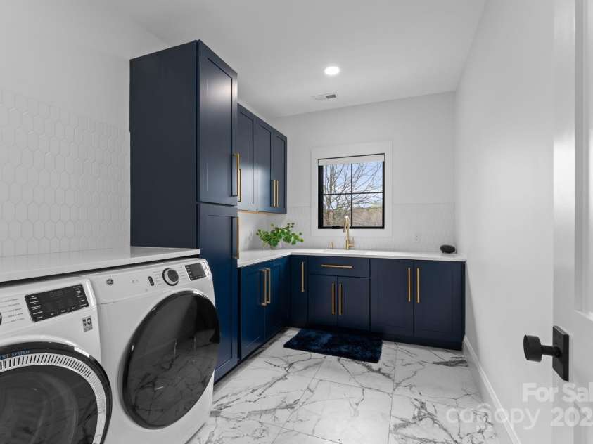 1565 Shinnville Road, Cleveland, NC 27013.  MLS# CAR4215250, YatesRealty ID 855. Upper level laundry room 