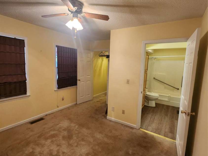 201 Ridge View Circle, Lake Lure, NC 28746.  MLS# CAR4214913, YatesRealty ID 8553. Main Level Bedroom