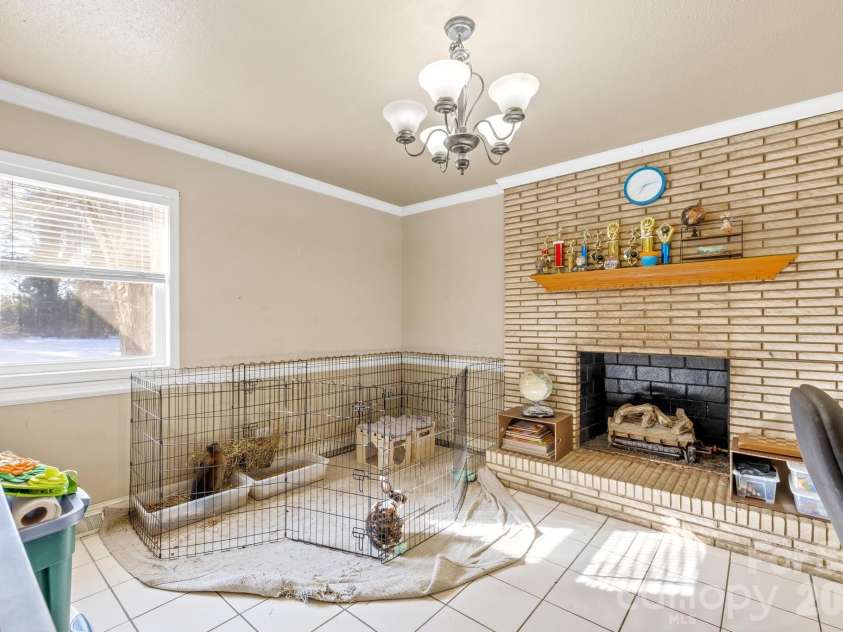 6711 Old Mocksville Road, Salisbury, NC 28144.  MLS# CAR4343686, YatesRealty ID 8553. Main house den/dining room