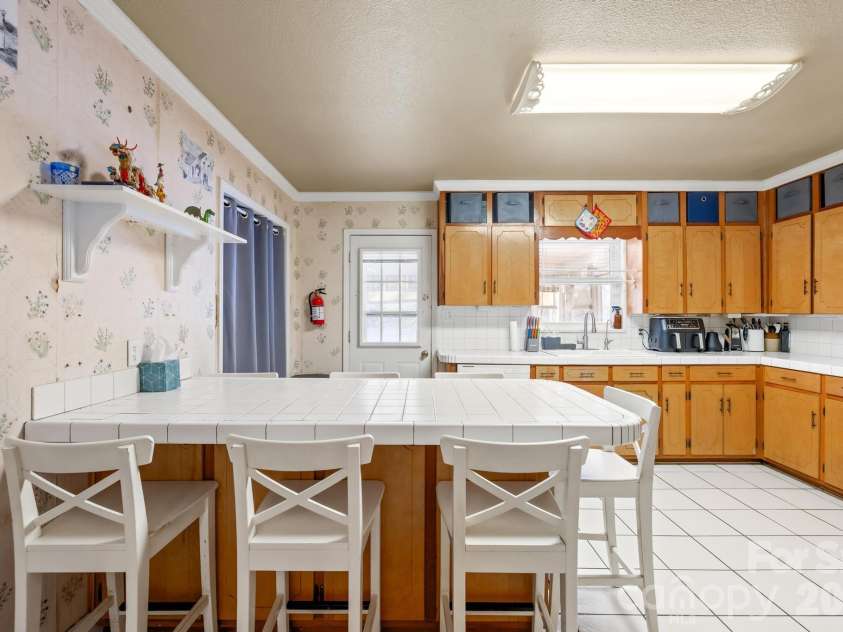 6711 Old Mocksville Road, Salisbury, NC 28144.  MLS# CAR4343686, YatesRealty ID 8553. Main house kitchen