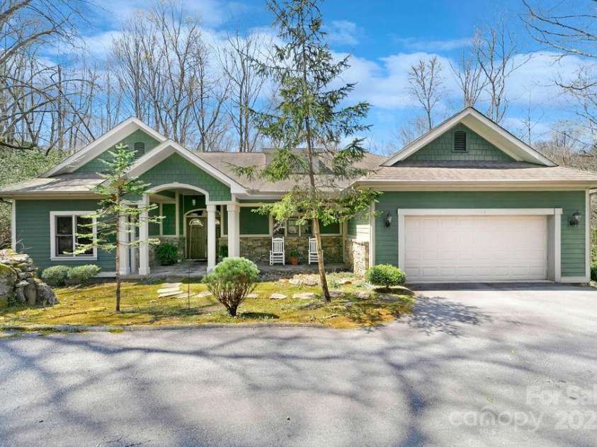 43 Adelv Court, Brevard, NC 28712.  MLS# CAR4248792, YatesRealty ID 8556. Nestled in Connestee Falls, this charming retreat offers low maintenance living. Enjoy quiet mornings, peaceful strolls, and a home designed for life’s next chapter.