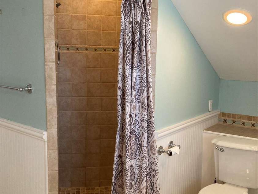 1051 Pee Dee Avenue, Albemarle, NC 28001.  MLS# CAR4328928, YatesRealty ID 8560. En-suite primary bath shower.