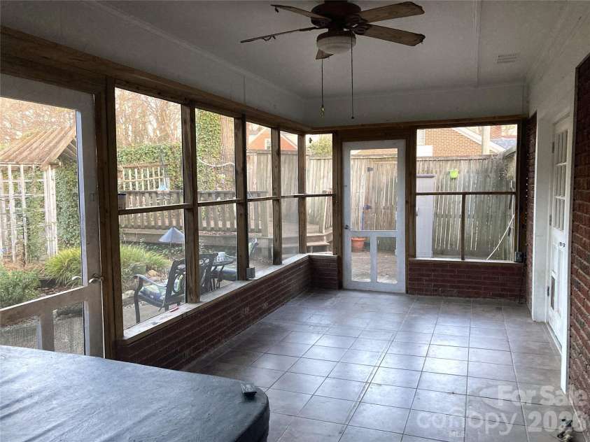 1051 Pee Dee Avenue, Albemarle, NC 28001.  MLS# CAR4328928, YatesRealty ID 8560. Rear screened porch