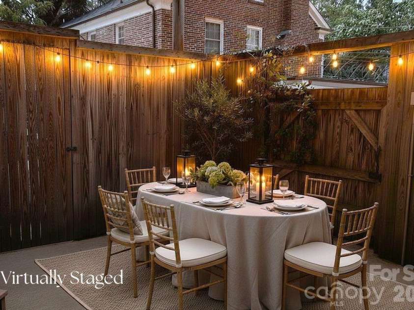 1051 Pee Dee Avenue, Albemarle, NC 28001.  MLS# CAR4328928, YatesRealty ID 8560. Virtually staged patio for outdoor dining.