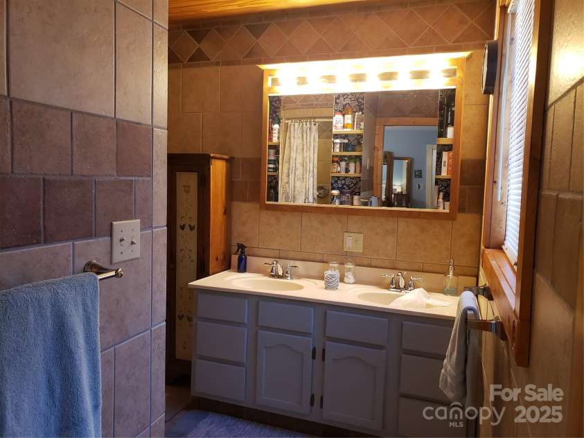 1055 Stagger weed Road, Bakersville, NC 28705.  MLS# CAR4234895, YatesRealty ID 8562. 