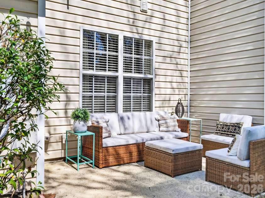 9977 Reindeer Way Lane, Charlotte, NC 28216.  MLS# CAR4351235, YatesRealty ID 8564. Back Patio 