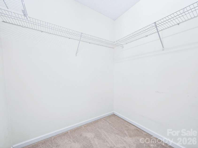 9977 Reindeer Way Lane, Charlotte, NC 28216.  MLS# CAR4351235, YatesRealty ID 8564. Primary Suite 