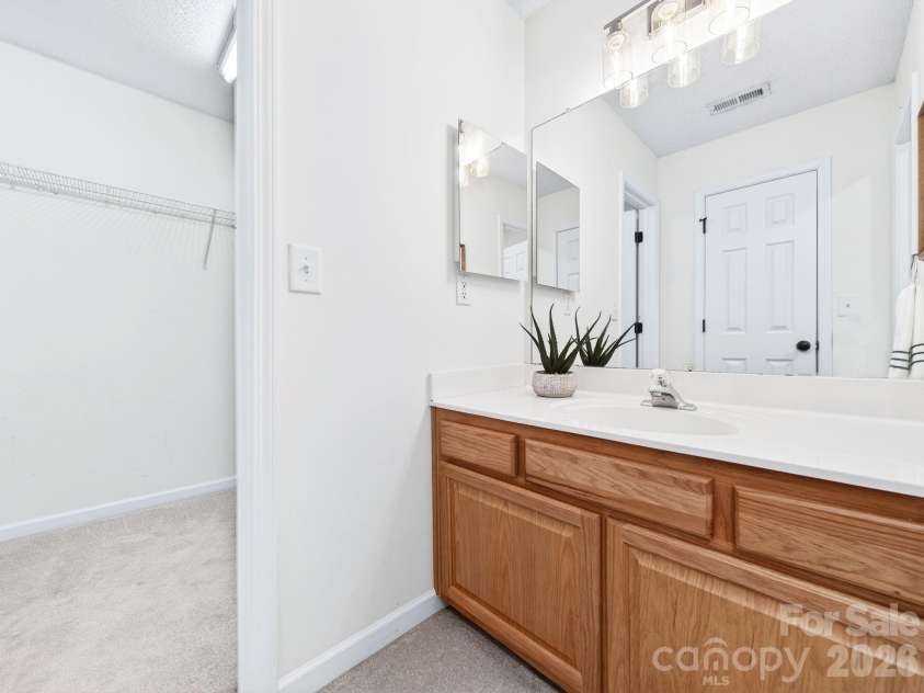 9977 Reindeer Way Lane, Charlotte, NC 28216.  MLS# CAR4351235, YatesRealty ID 8564. Second Primary Suite