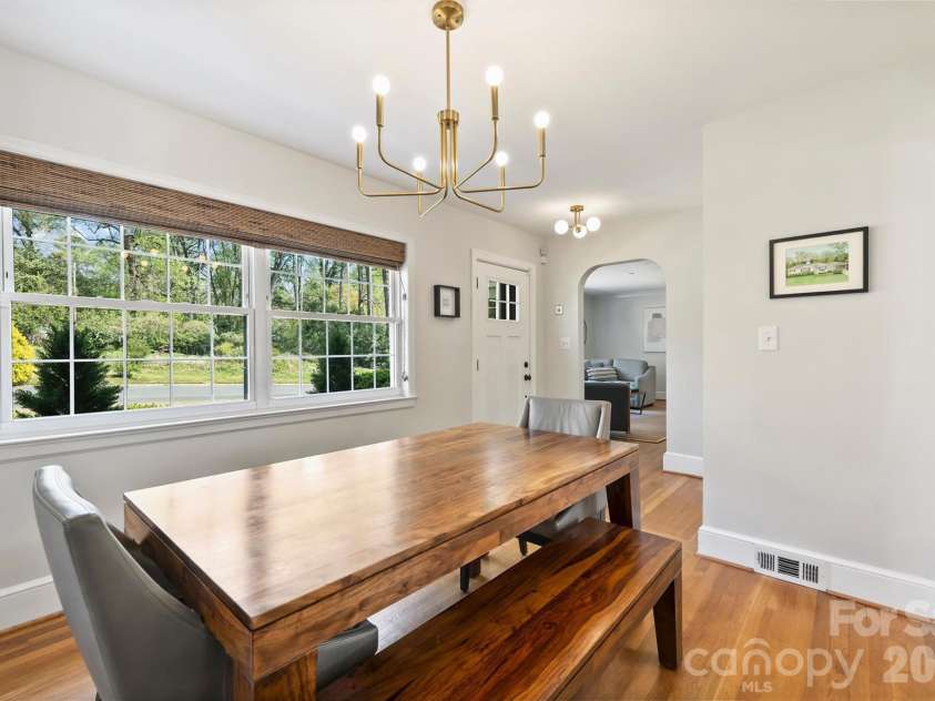 3608 Ellen Avenue, Charlotte, NC 28205.  MLS# CAR4361918, YatesRealty ID 8569. Dining room features fresh paint and updated lighting.
