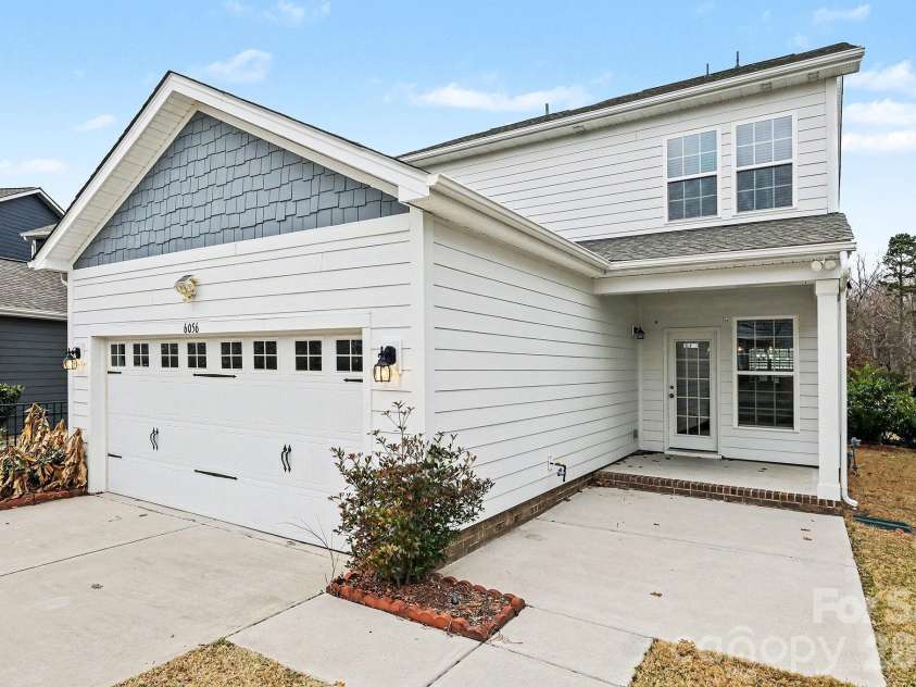 6056 Cloverdale Drive, Tega Cay, SC 29708.  MLS# CAR4337885, YatesRealty ID 8573. Extended back patio