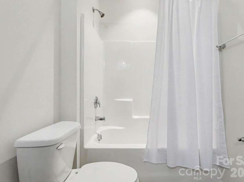 6056 Cloverdale Drive, Tega Cay, SC 29708.  MLS# CAR4337885, YatesRealty ID 8573. Jack and jill bathroom