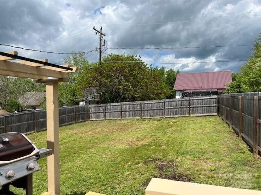 61 Third Street, Marion, NC 28752.  MLS# CAR4251216, YatesRealty ID 8573. Back Yard