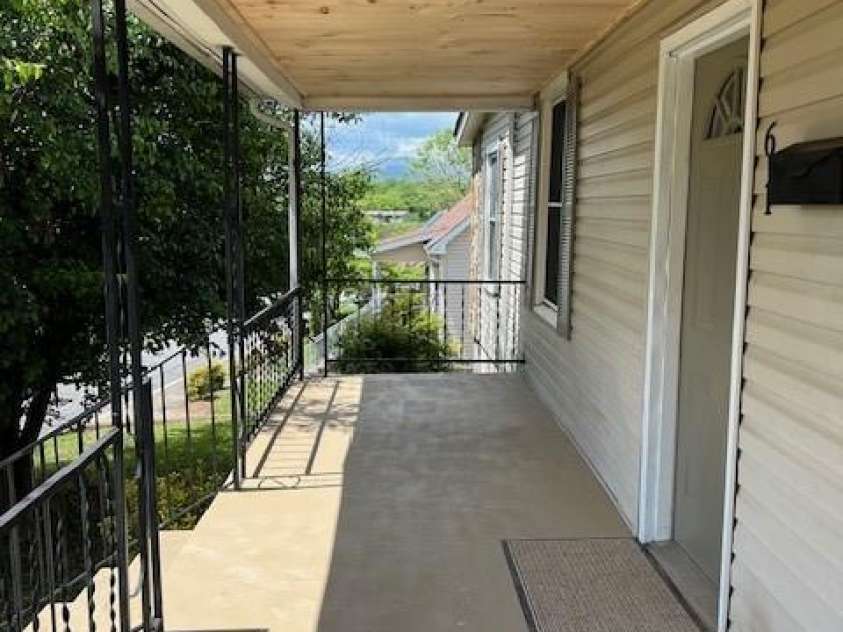 61 Third Street, Marion, NC 28752.  MLS# CAR4251216, YatesRealty ID 8573. Covered Front Porch