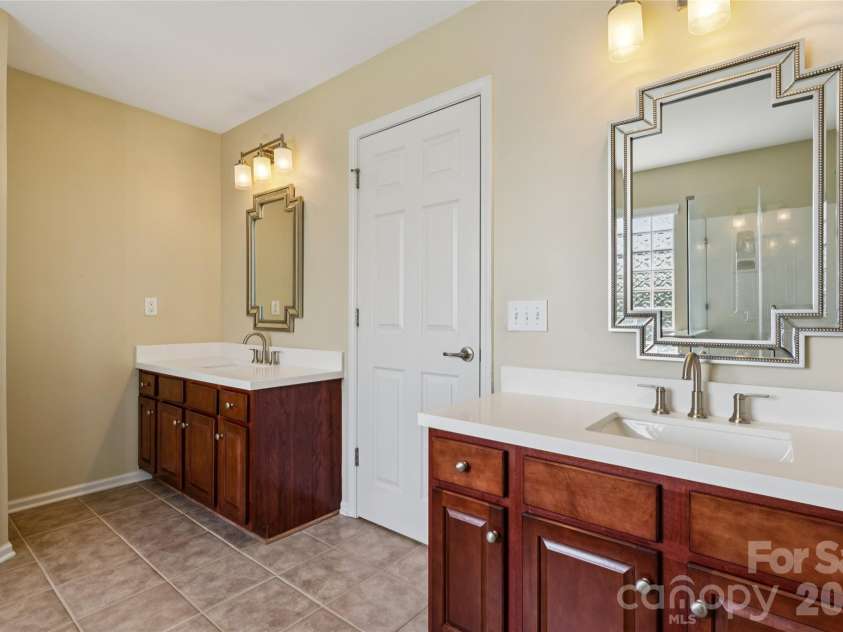 9509 Gilead Grove Road, Huntersville, NC 28078.  MLS# CAR4401597, YatesRealty ID 8574. Primary Bathroom with dual separate Vanities