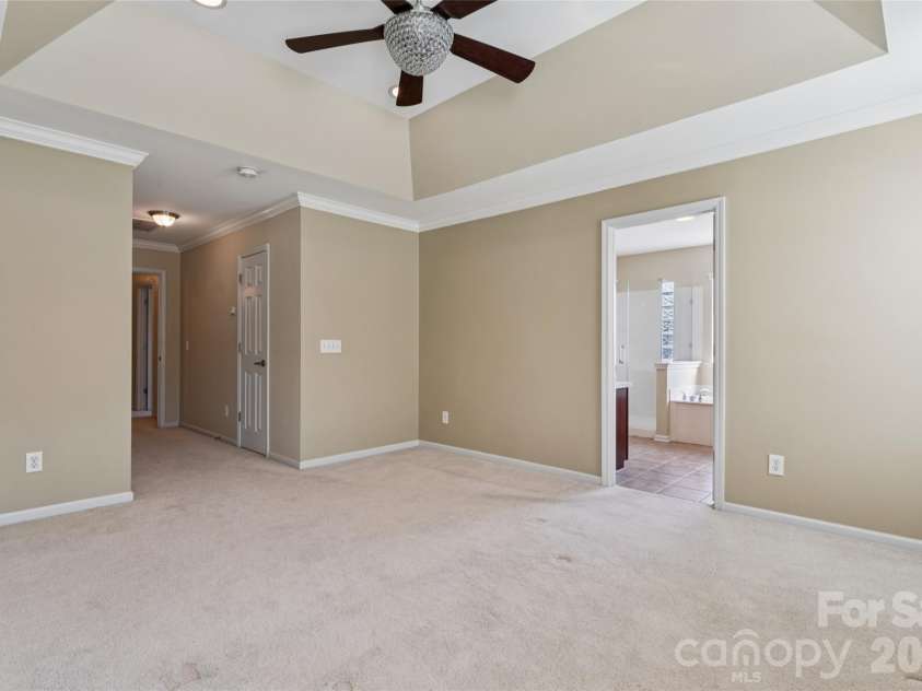 9509 Gilead Grove Road, Huntersville, NC 28078.  MLS# CAR4401597, YatesRealty ID 8574. Primary Bedroom with Tray Ceiling, Ceiling Fan has remote