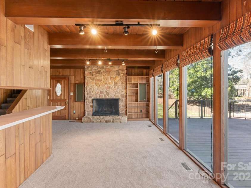 2700 River Ridge Place, Fort Mill, SC 29708.  MLS# CAR4220030, YatesRealty ID 8579. Attached Guest House Family room