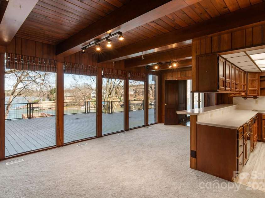 2700 River Ridge Place, Fort Mill, SC 29708.  MLS# CAR4220030, YatesRealty ID 8579. Attached Guest House  Living space with view of Lake Wylie