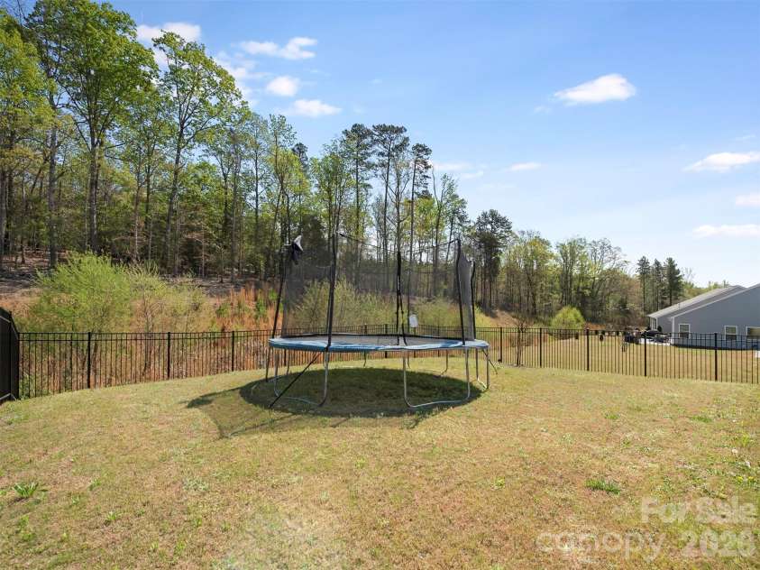 966 Scotch Meadows Loop, Monroe, NC 28110.  MLS# CAR4365046, YatesRealty ID 8583. Back Yard 3!