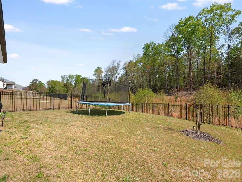 966 Scotch Meadows Loop, Monroe, NC 28110.  MLS# CAR4365046, YatesRealty ID 8583. Backyard 1!