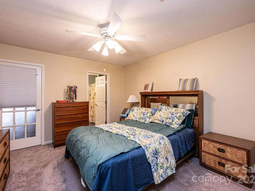 749 21st Avenue, Hickory, NC 28601.  MLS# CAR4217315, YatesRealty ID 8586. Primary bedroom with added bath and access to your sunroom