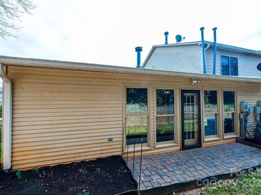 749 21st Avenue, Hickory, NC 28601.  MLS# CAR4217315, YatesRealty ID 8586. Relax on your peaceful back patio