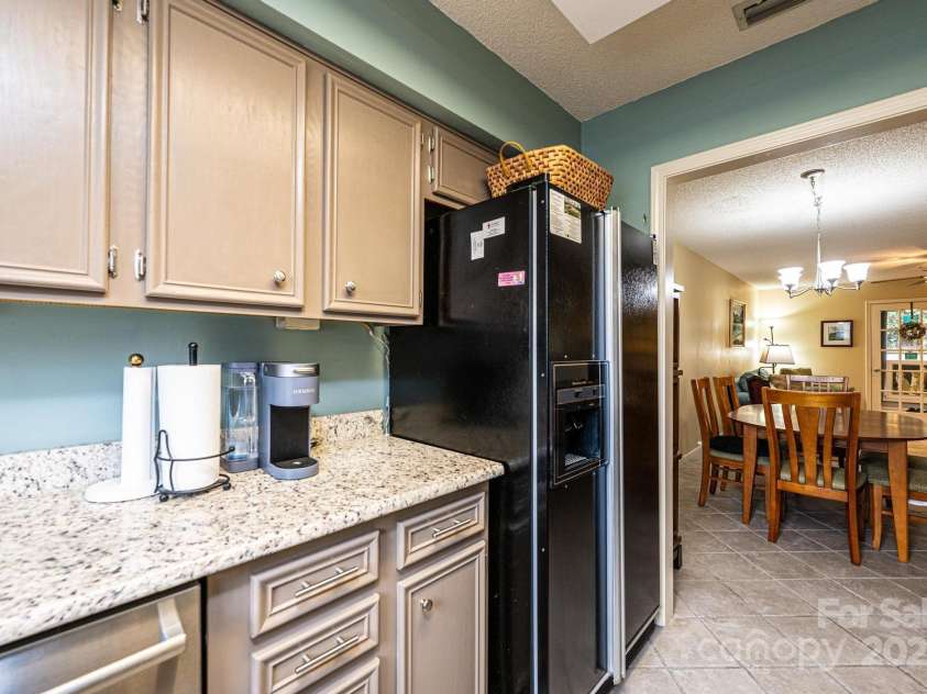 749 21st Avenue, Hickory, NC 28601.  MLS# CAR4217315, YatesRealty ID 8586. The floorplan flows seamlessly from the kitchen into the dining area