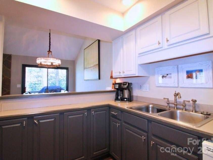 135 Mountain Village Boulevard, Lake Lure, NC 28746.  MLS# CAR4230948, YatesRealty ID 8587. 