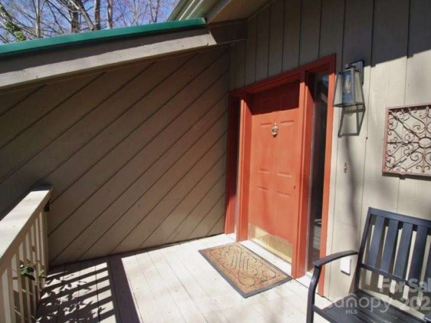 135 Mountain Village Boulevard, Lake Lure, NC 28746.  MLS# CAR4230948, YatesRealty ID 8587. 