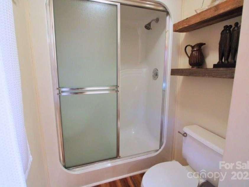 135 Mountain Village Boulevard, Lake Lure, NC 28746.  MLS# CAR4230948, YatesRealty ID 8587. 