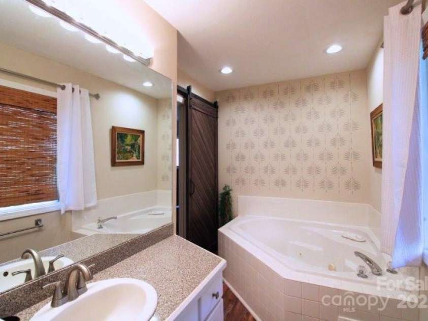 135 Mountain Village Boulevard, Lake Lure, NC 28746.  MLS# CAR4230948, YatesRealty ID 8587. 