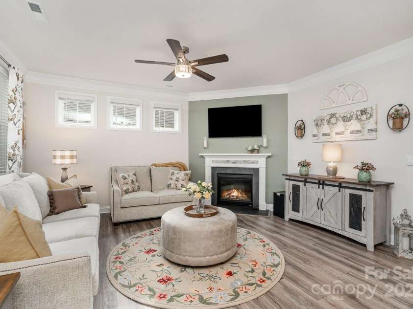 4023 Gozzi Drive, Iron Station, NC 28080.  MLS# CAR4223127, YatesRealty ID 8588. Natural light floods the home through the many windows.