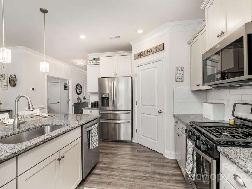 4023 Gozzi Drive, Iron Station, NC 28080.  MLS# CAR4223127, YatesRealty ID 8588. Walk-in Pantry!