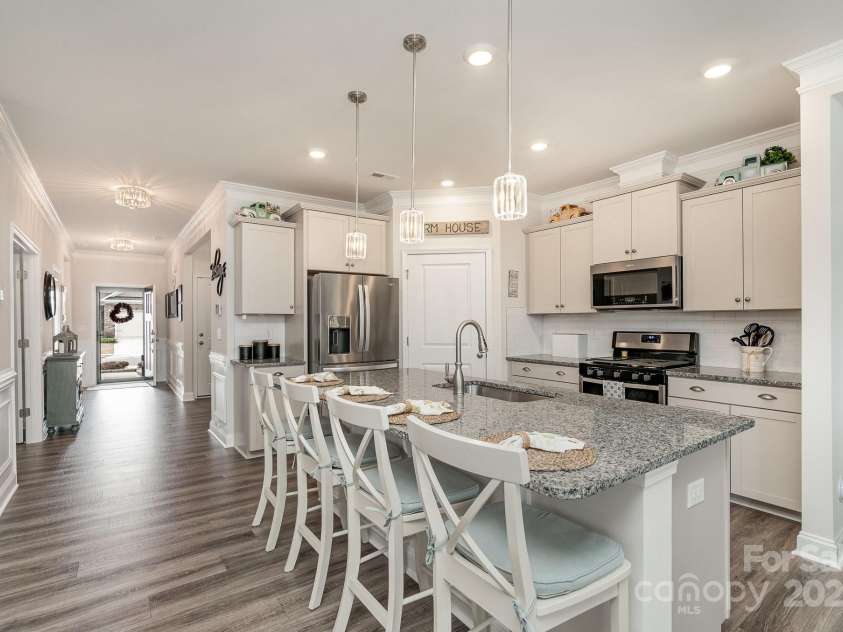 4023 Gozzi Drive, Iron Station, NC 28080.  MLS# CAR4223127, YatesRealty ID 8588. Wide hallways make moving through the home easy