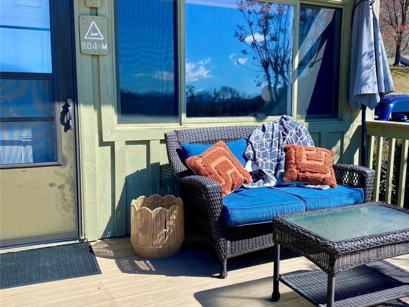 135 Fox Run Boulevard, Lake Lure, NC 28746.  MLS# CAR4226040, YatesRealty ID 8591. Great front deck