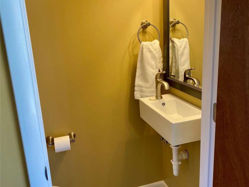 135 Fox Run Boulevard, Lake Lure, NC 28746.  MLS# CAR4226040, YatesRealty ID 8591. Half bath on first floor