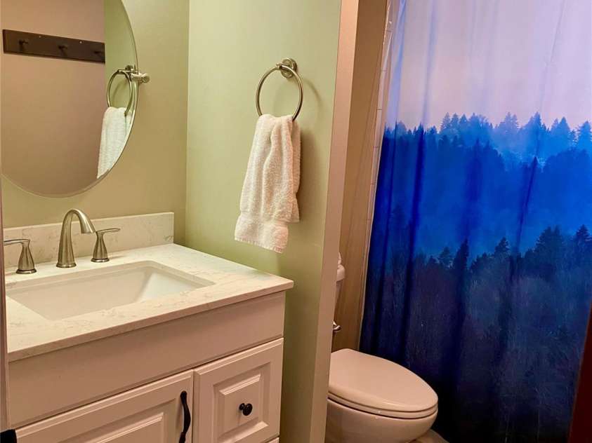 135 Fox Run Boulevard, Lake Lure, NC 28746.  MLS# CAR4226040, YatesRealty ID 8591. Updated vanity’s