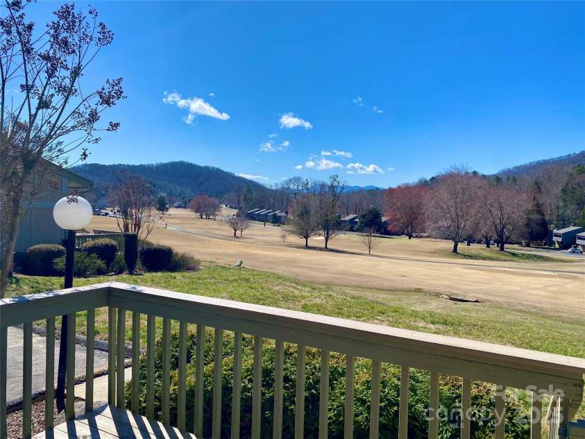 135 Fox Run Boulevard, Lake Lure, NC 28746.  MLS# CAR4226040, YatesRealty ID 8591. View off upstairs deck