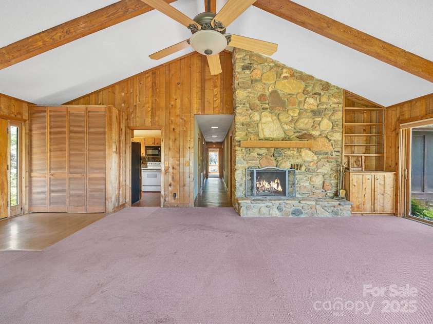 177 Fowler Road, Mill Spring, NC 28756.  MLS# CAR4249050, YatesRealty ID 8594. Large living room in the main section of the house has its own outside entry door.