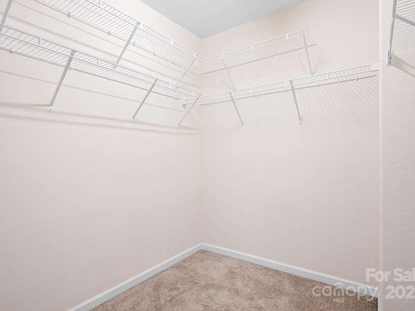 9230 Avery Meadows Drive, Charlotte, NC 28216.  MLS# CAR4241146, YatesRealty ID 8595. PRIMARY BEDROOM CLOSET
